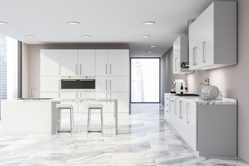 Loft beige kitchen with countertops and bar