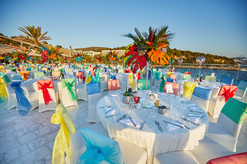 Festive served sea view terrace restaurant for corporate banquet or wedding
