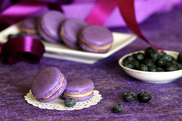 Obraz na płótnie Canvas Macaron blueberry cookies sweet pastry with berries