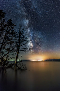 Milky way galaxy above the blue lake. Sevan lake Armenia.