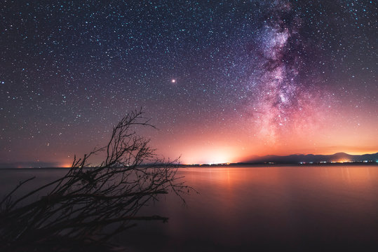 Milky way galaxy above the blue lake. Sevan lake Armenia.