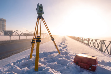 Theodolite. Topographic equipment. Theodolite stands on a tripod. Topographical measurements....