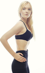 Fototapeta premium woman with long blond hair. Fashion model posing at studio.