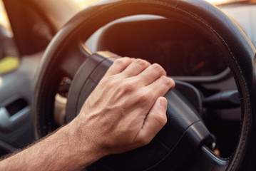 Nervous driver pushing car horn