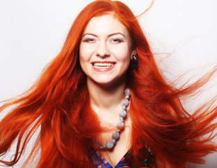 woman with long flowing red hair