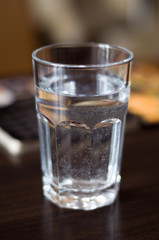 Glass with mineral water on the table