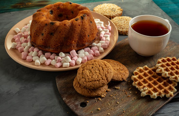 cookies, cracker, shortbread, tea, lemon, mint, chocolate, grey background, lemon, mint hour, black tea,