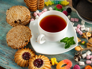cookies, cracker, shortbread, tea, lemon, mint, chocolate, grey background, lemon, mint hour, black tea,