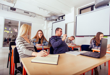 Students listening carefully on class