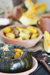 Baked whole pumpkin with potatoes
