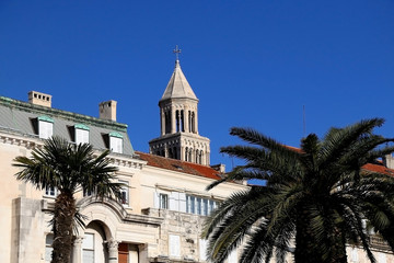 Fototapeta na wymiar Historical architecture on Riva Promenade in Split, Croatia with landmark Saint Domnius bell tower.