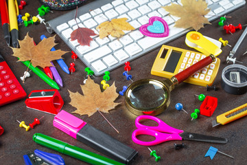 Back to school. Items for school classes in the composition on the table.