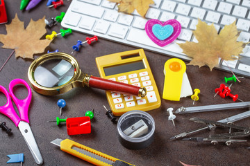 Back to school. Items for school classes in the composition on the table.