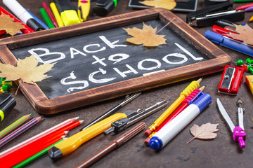 Back to school. Items for school classes in the composition on the table.