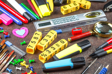 Back to school. Items for school classes in the composition on the table.