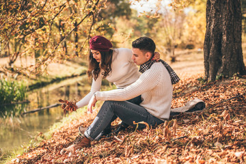Fototapeta premium Couple in love enjoying the view of the river