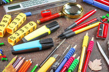 Back to school. Items for school classes in the composition on the table.