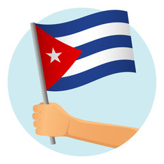 Cuba flag in hand