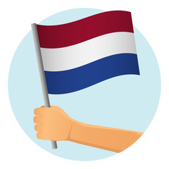 netherlands flag in hand