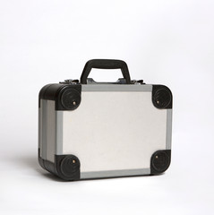 small silver metal case on white background