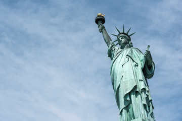 Fototapeta premium The Statue of Liberty isolated against the sky