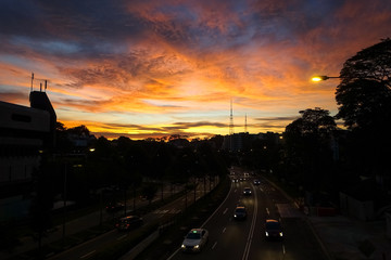 Fototapeta na wymiar Singapore Sunset and Traffic on Flyover - Bukit Timah Road, Singapore