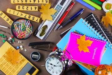 Back to school. Items for school classes in the composition on the table.
