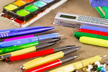 Fototapeta premium Back to school. School subjects for study, rotate on the table.