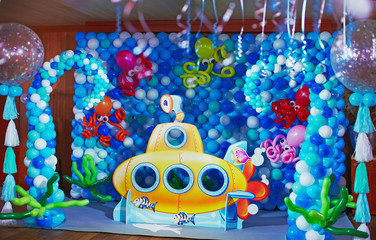 Kids birhtday party decorated with ballons sea concept and yellow submarine