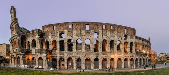Fototapeta na wymiar The Colosseum or Coliseum, also known as the Flavian Amphitheatre, is an oval amphitheatre in the centre of the city of Rome, Italy. It is the largest amphitheatre ever built.