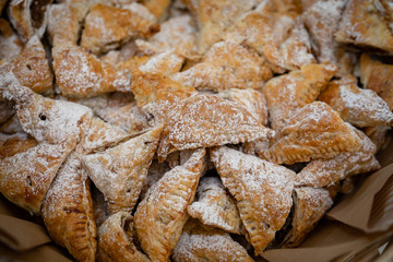 National Kazakh pastries, mutaki sprinkled with powdered sugar.