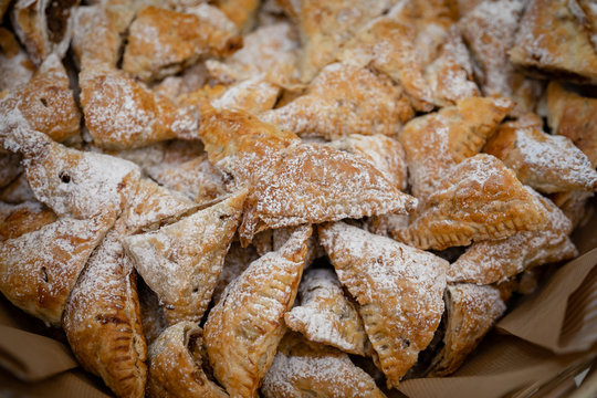 National Kazakh pastries, mutaki sprinkled with powdered sugar.