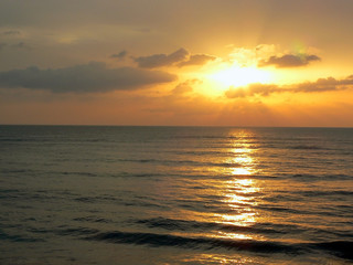 sunset on the coast of the beach bay of the city of Cadiz, Andalusia. Spain. Europe