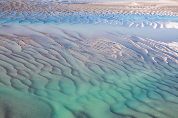 Aerial view of ocean at low tide off Roebuck Bay, Broome, Western Australia