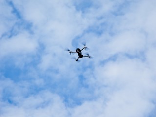 Fototapeta na wymiar Drone against the blue sky