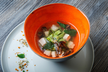 top view tasty noodle soup with mushrooms and nettle leaves