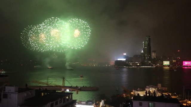 Beautiful New Year Fireworks over Victoria Harbor in Hong Kong