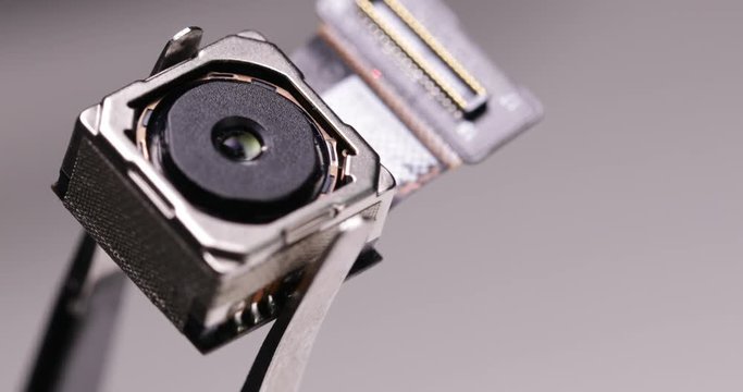 Use tweezers to hold digital spy camera