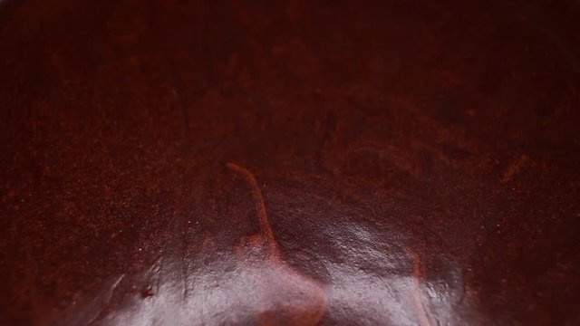 Chocolate choco creme food closeup texture pattern. Seamless looping video footage
