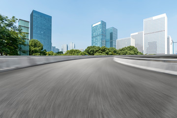 Fototapeta na wymiar Highway Road and Skyline of Modern Urban Architecture in Hangzhou..