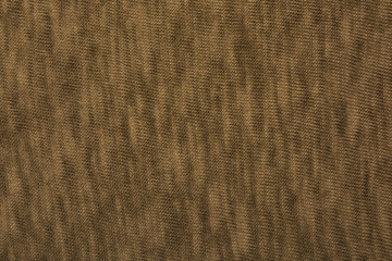Abstract beige knitted fabric for background.Knitted texture.