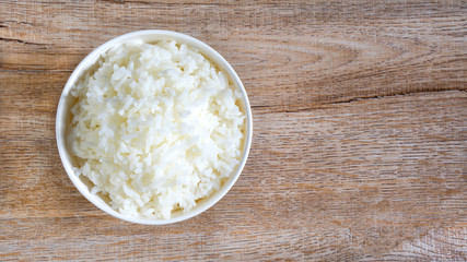 Cooked jasmine rice in white bowl