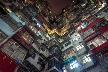 Fototapeta na wymiar Looking up at apartment buildings in Hong Kong
