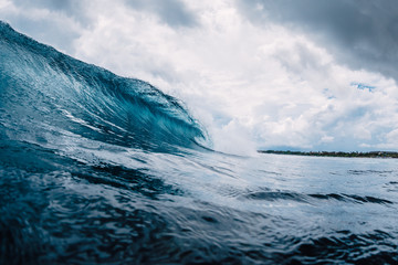 Blue wave in ocean. Breaking wave in Oahu