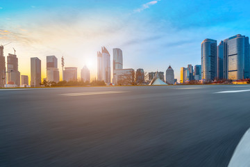Obraz premium Highway Road and Skyline of Modern Urban Architecture in Qingdao..