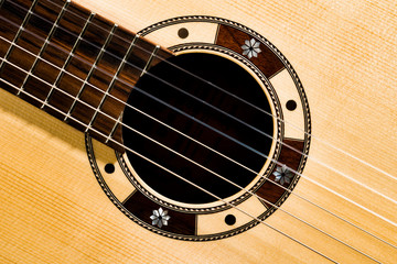 Obraz premium Closeup of rosette sound hole of an acoustic guitar
