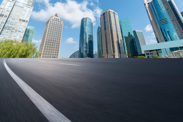 Fototapeta premium Highway Road and Skyline of Modern Urban Buildings in Shanghai..
