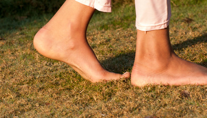 Feet on the wet grass