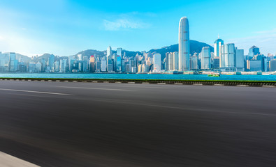 Road and skyline of modern urban architecture in Hong Kong..