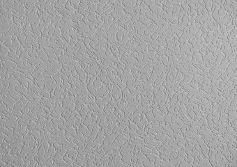 Gray white light textured wall background with copy space for your text.